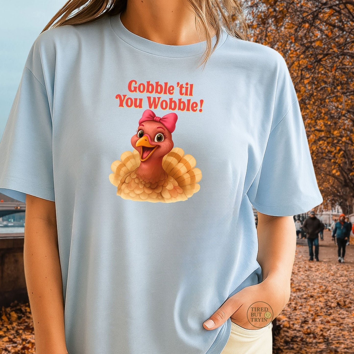 Gobble ’Til You Wobble Turkey Shirt – Funny Thanksgiving Tee, Smiling Female Turkey with Coquette Bow, Friendsgiving Graphic Top - Light Blue