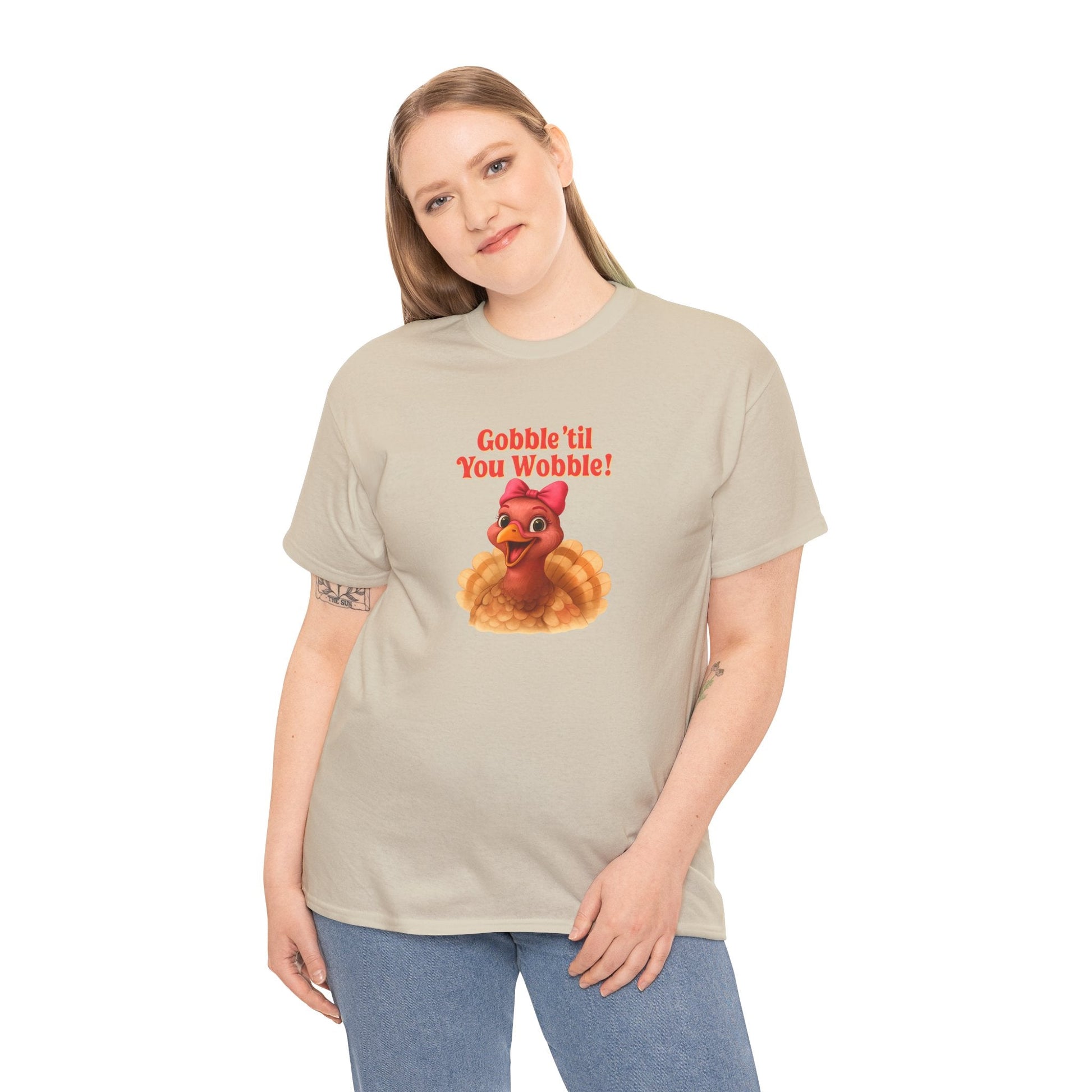 Gobble ’Til You Wobble Turkey Shirt – Funny Thanksgiving Tee, Smiling Female Turkey with Coquette Bow, Friendsgiving Graphic Top - Sand